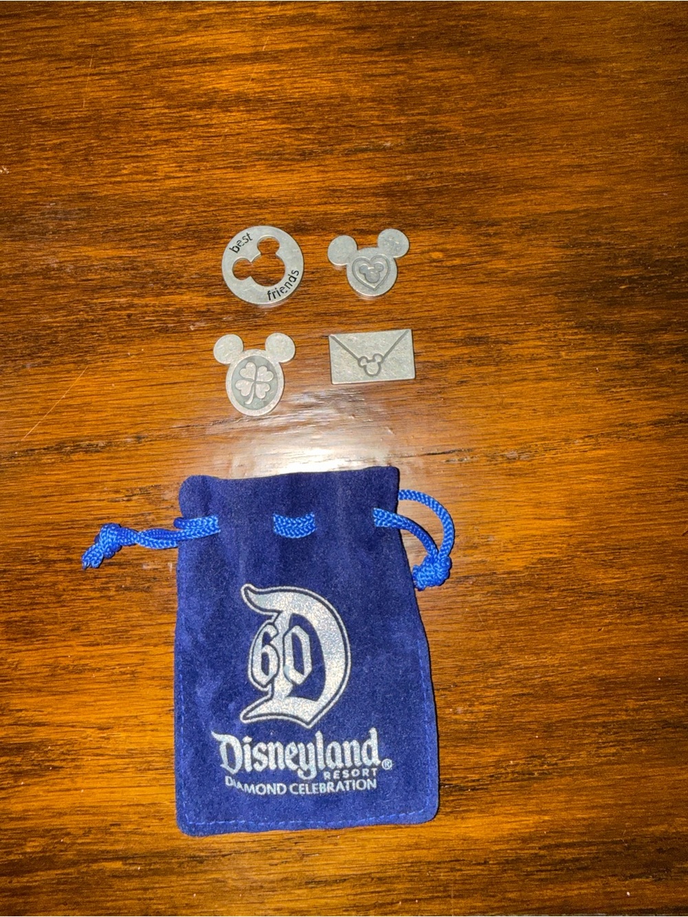 Disneyland 60th Anniversary draw pouch with 4 Silver Charms